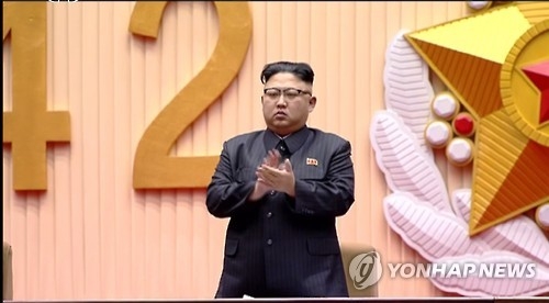 2月15日，在平壤，金正恩出席金正日“诞辰”75周年中央报告大会。图片仅限韩国国内使用，严禁转载复制。