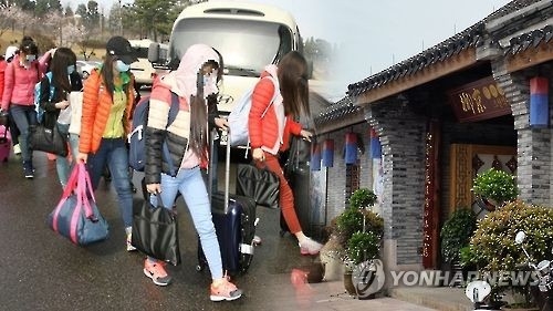 12名投韩朝鲜驻华餐厅员工全部在韩上大学 - 1