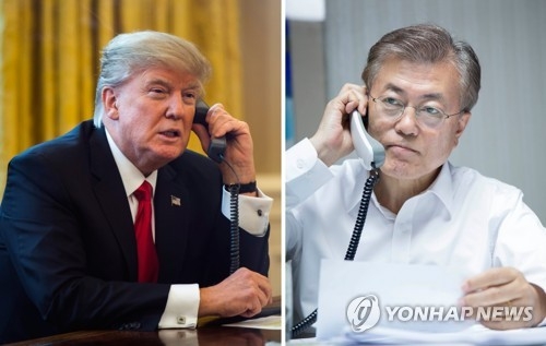 5月10日晚，韩国新任总统文在寅（右）美国总统特朗普通电话。