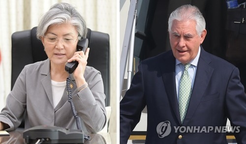 资料图片：韩国外长康京和（左）与美国国务卿蒂勒森 （韩联社/韩国外交部提供）