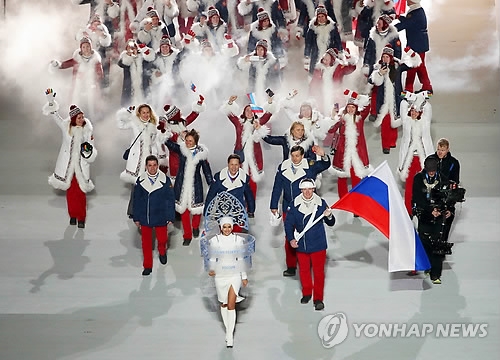 俄罗斯国旗不会出现在平昌冬奥，图为俄罗斯体育代表团亮相索契冬奥开幕式。（韩联社）