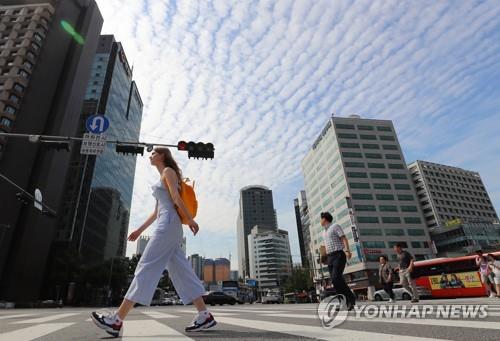 资料图片：首尔一街头 韩联社