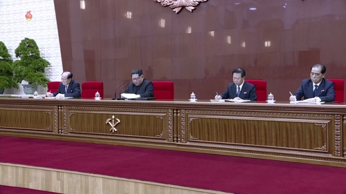 资料图片：朝鲜劳动党第七届中央委员会第三次全体会议现场，左一为朴奉珠。 韩联社/朝中社（图片仅限韩国国内使用，严禁转载复制）