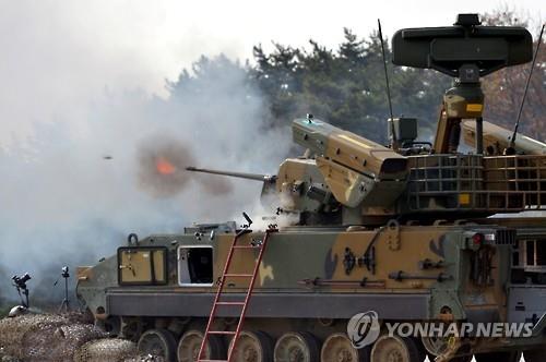 资料图片：“飞虎”武器射击现场 韩联社