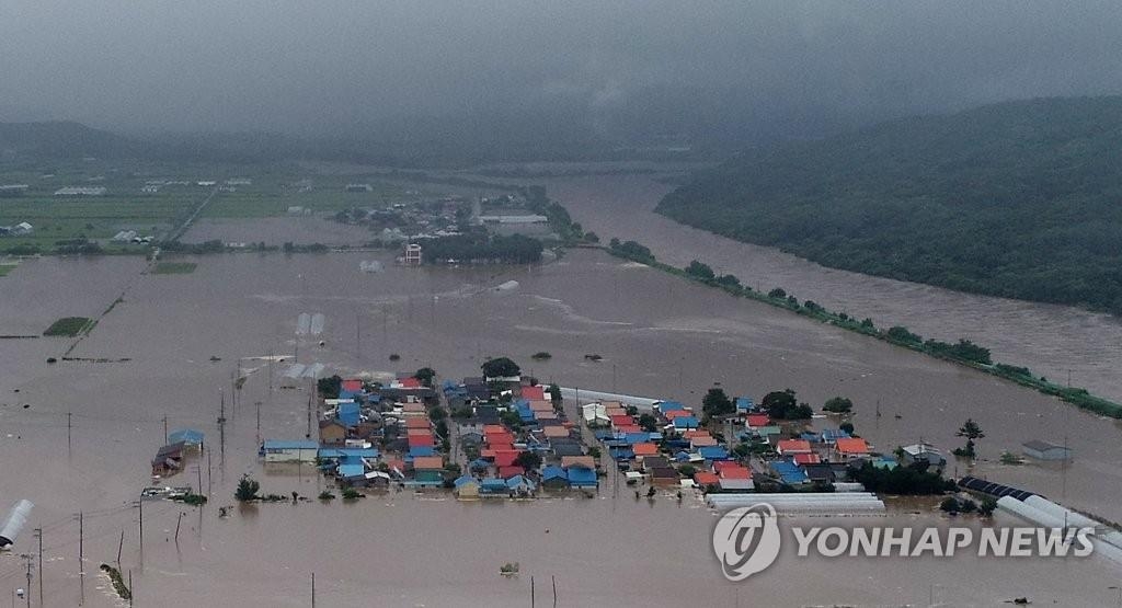 韩政府将7个市郡划为暴雨特别灾区