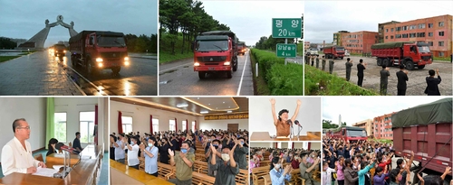 《劳动新闻》8月10日报道，装载国务委员会委员长金正恩备用粮食的卡车9日抵达黄海北道银波郡大青里洪水灾区。 韩联社/《劳动新闻》官网截图（图片仅限韩国国内使用，严禁转载复制）