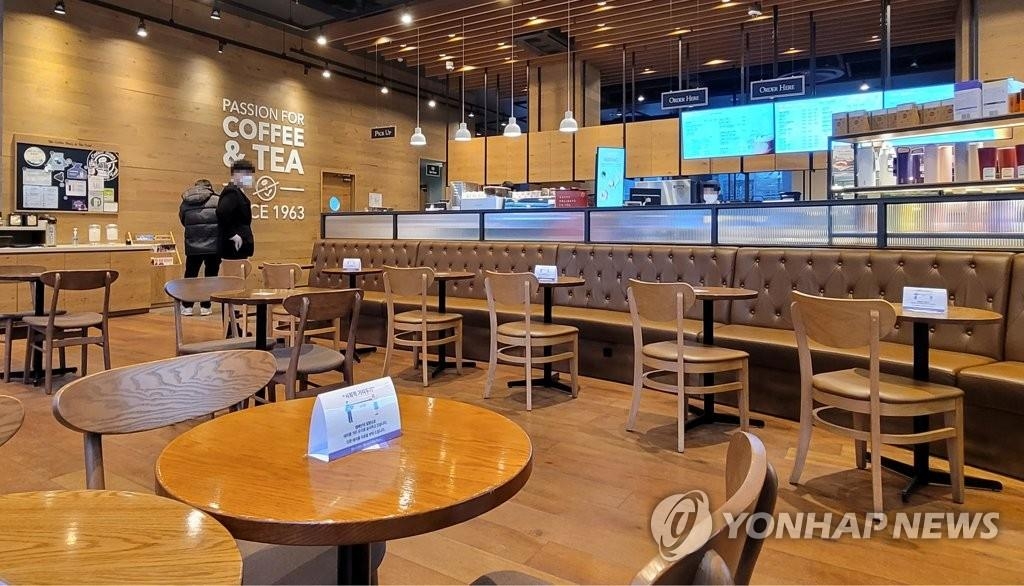 资料图片：首尔市区一家咖啡馆 韩联社