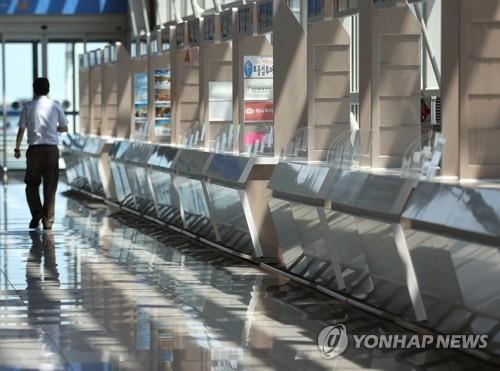 资料图片：5月19日，仁川国际机场第一航站楼格外冷清。 韩联社