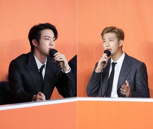 资料图片：防弹少年团（BTS）成员Jin（左）和RM 韩联社/BIGHIT MUSIC供图（图片严禁转载复制）