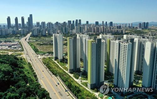资料图片：仁川市东春洞和松岛国际新城的高层住宅楼 韩联社
