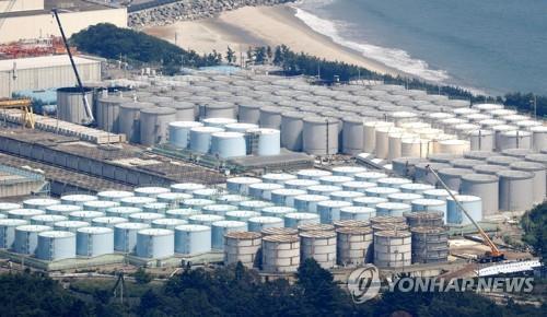 资料图片：福岛第一核电站核污水储存罐 韩联社