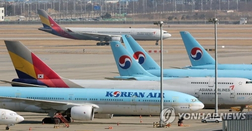 资料图片：大韩航空和韩亚航空客机 韩联社