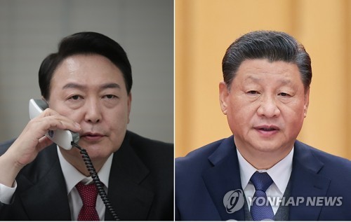资料图片：韩国总统尹锡悦（左）和中国国家主席习近平 韩联社