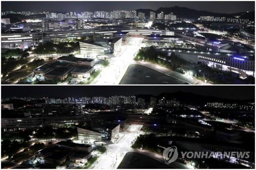 资料图片：2021年4月22日，韩国政府世宗办公楼迎来世界地球日加入关灯行动。下图为关灯后。 韩联社