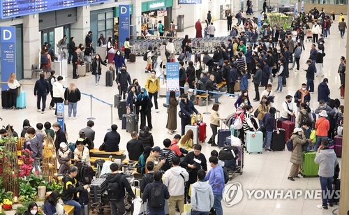 资料图片：仁川国际机场第一航站楼入境大厅 韩联社