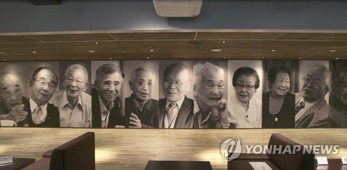 资料图片：日本产业遗产信息中心展出的强征劳工图片 日本产业遗产信心中心供图（图片严禁转载复制）