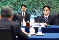 韩中经贸部门首长在京会晤商讨合作事宜