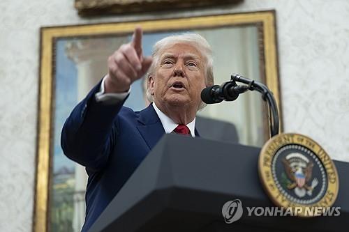 Seoul shares down late Fri. morning on tariff uncertainty