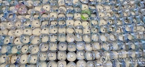 6 Americans nabbed for trying to send plastic bottles with rice, dollar bills to N. Korea
