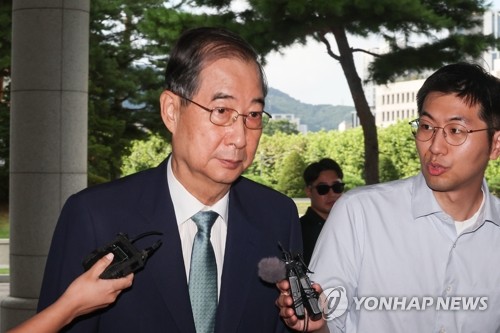 Ex-PM Han appears for special counsel questioning again in martial law probe