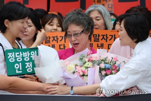 Court acquits woman of biting attempted rapist's tongue in retrial 61 yrs after conviction