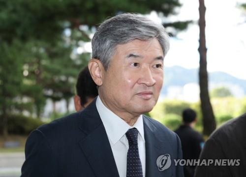 Ex-spy chief appears for questioning in special counsel probe into martial law