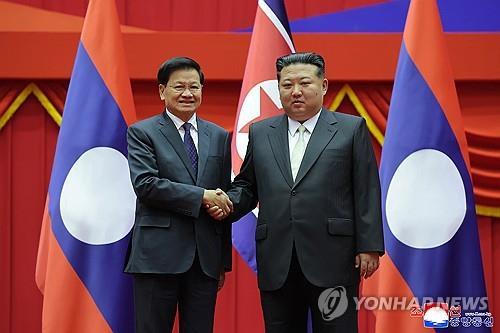 N. Korea's Kim tells Lao president bilateral friendship will further advance