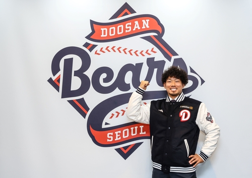 Bears sign Japanese pitcher Tamura to fill Asian quota