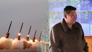 朝称发射火箭炮对韩示威 金正恩促抓核武