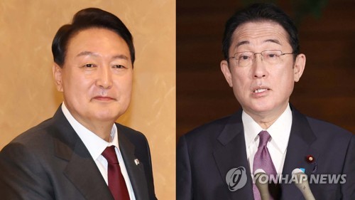 韩日首脑在北约晚宴短暂会晤