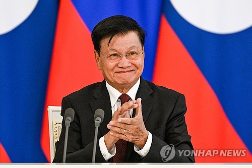 (LEAD) Laos' leader to visit N. Korea to mark key party anniv.: KCNA