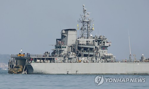 Main flames contained in Navy warship fire
