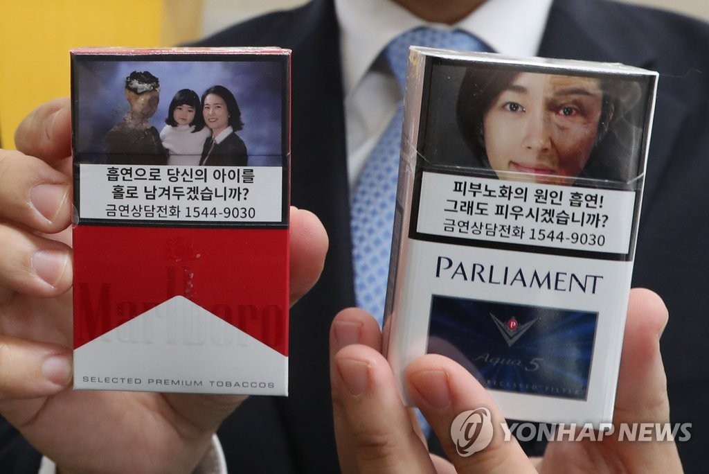 韩国为烟盒配“恐怖”警示图片