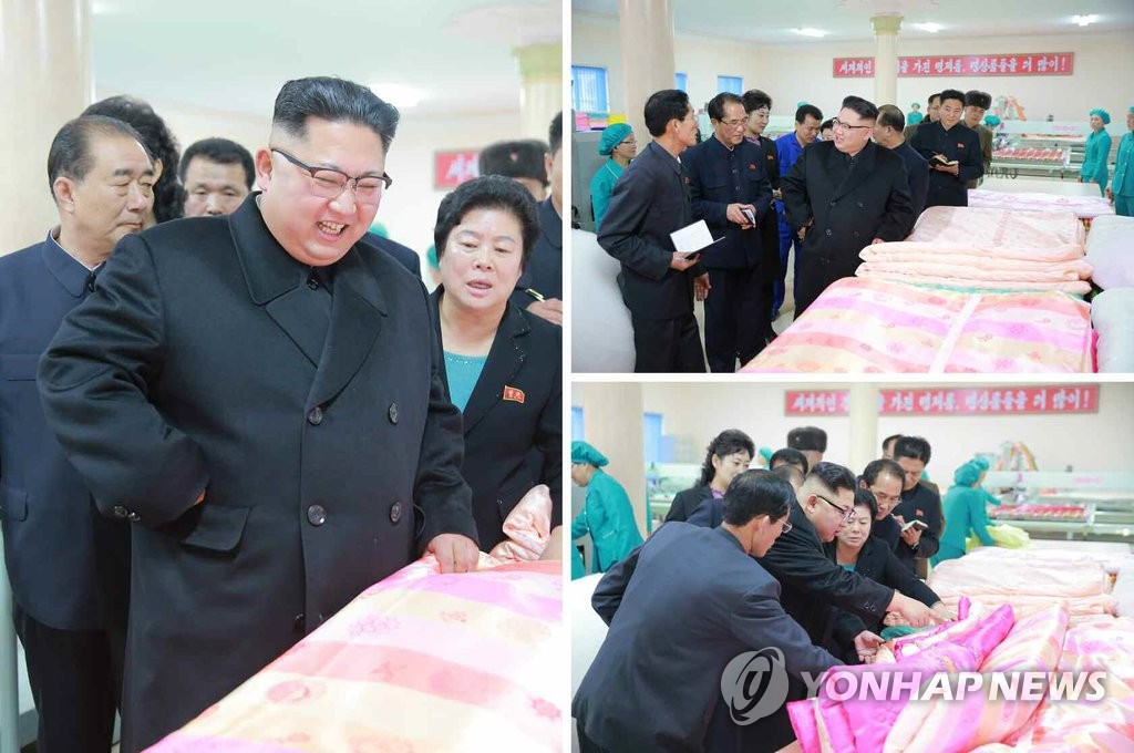 金正恩视察平壤纺织工厂