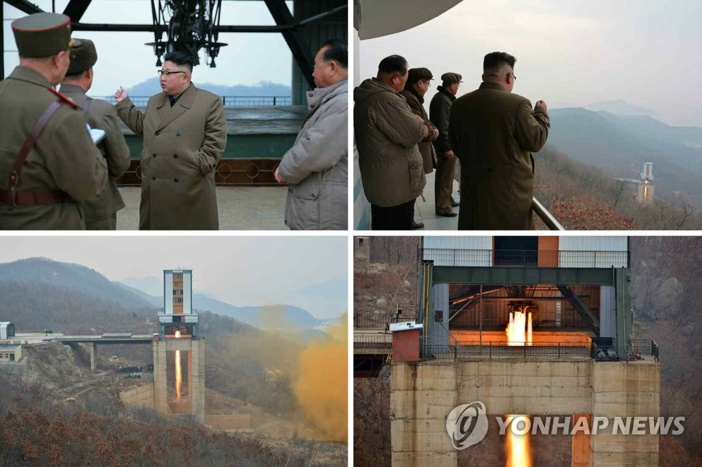 金正恩参观火箭发动机点火试验