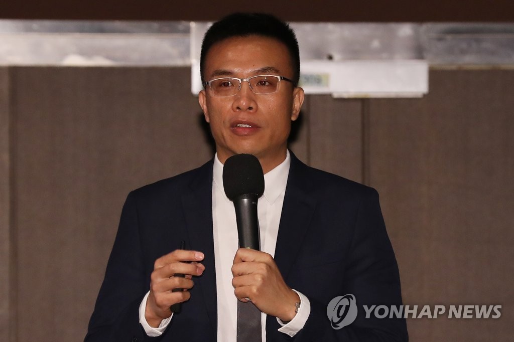 资料图片：2018年6月11日，在首尔COEX，天猫国际负责人在《阿里巴巴集团新零售及韩国核心项目战略说明会》上介绍公司业务战略。（韩联社）