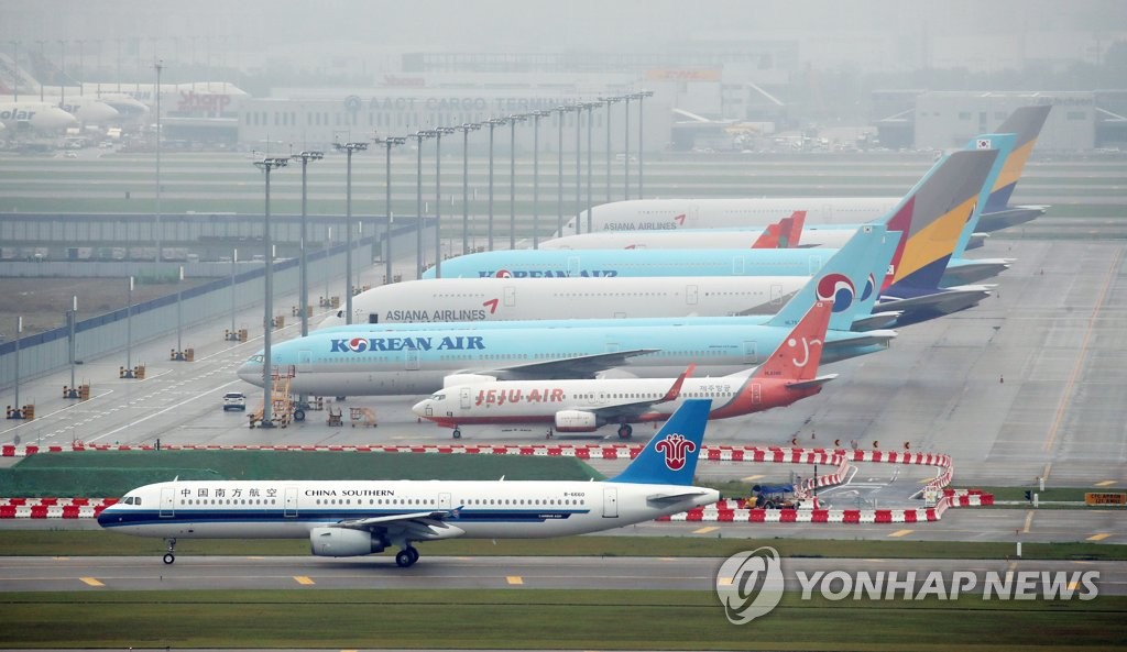 资料图片：停在仁川机场的中国南方航空班机 韩联社