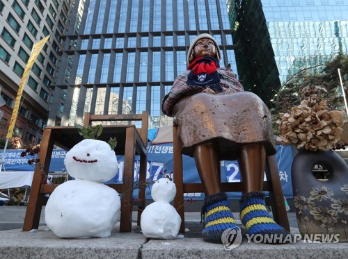 资料图片：设立于首尔市钟路区的“和平少女像” 韩联社