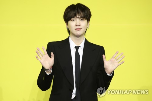 资料图片：防弹少年团SUGA 韩联社/BIGHIT MUSIC供图（图片严禁转载复制）