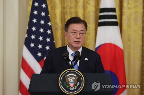 当地时间5月21日，在美国白宫，韩国总统文在寅在会晤美国总统拜登后共同会见记者。 韩联社