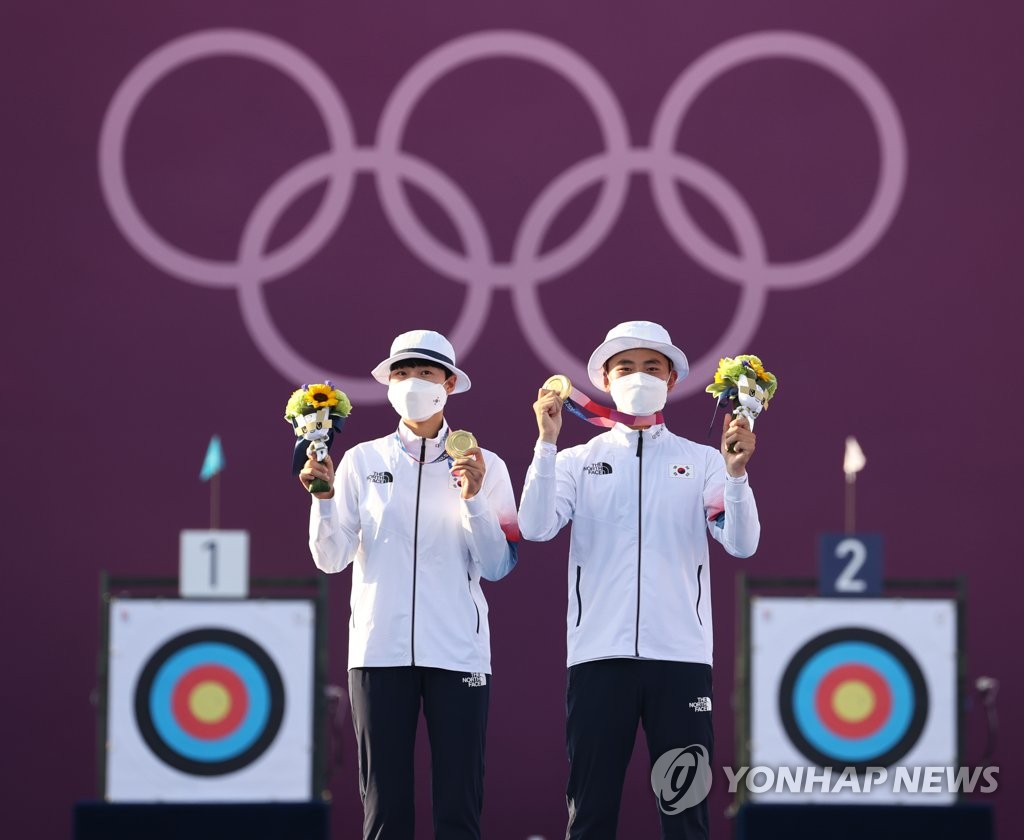 韩国射箭小将搭档夺金 韩国射箭小将搭档夺金