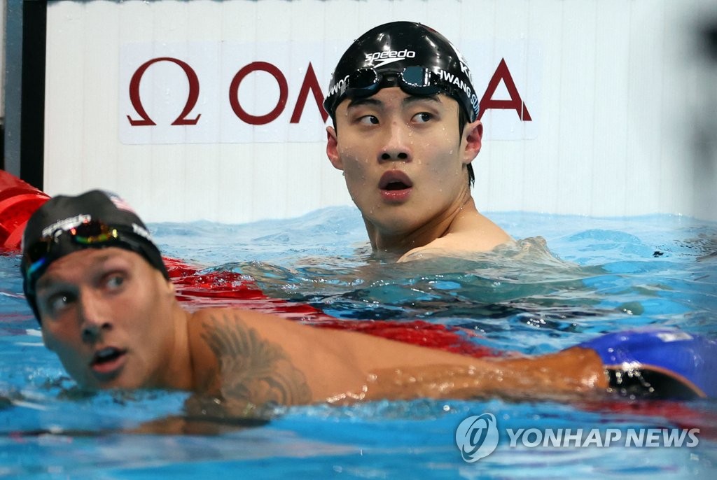 7月28日，在东京水上运动中心，黄宣优结束东京奥运会男子100米自由泳半决赛后确认成绩。 韩联社