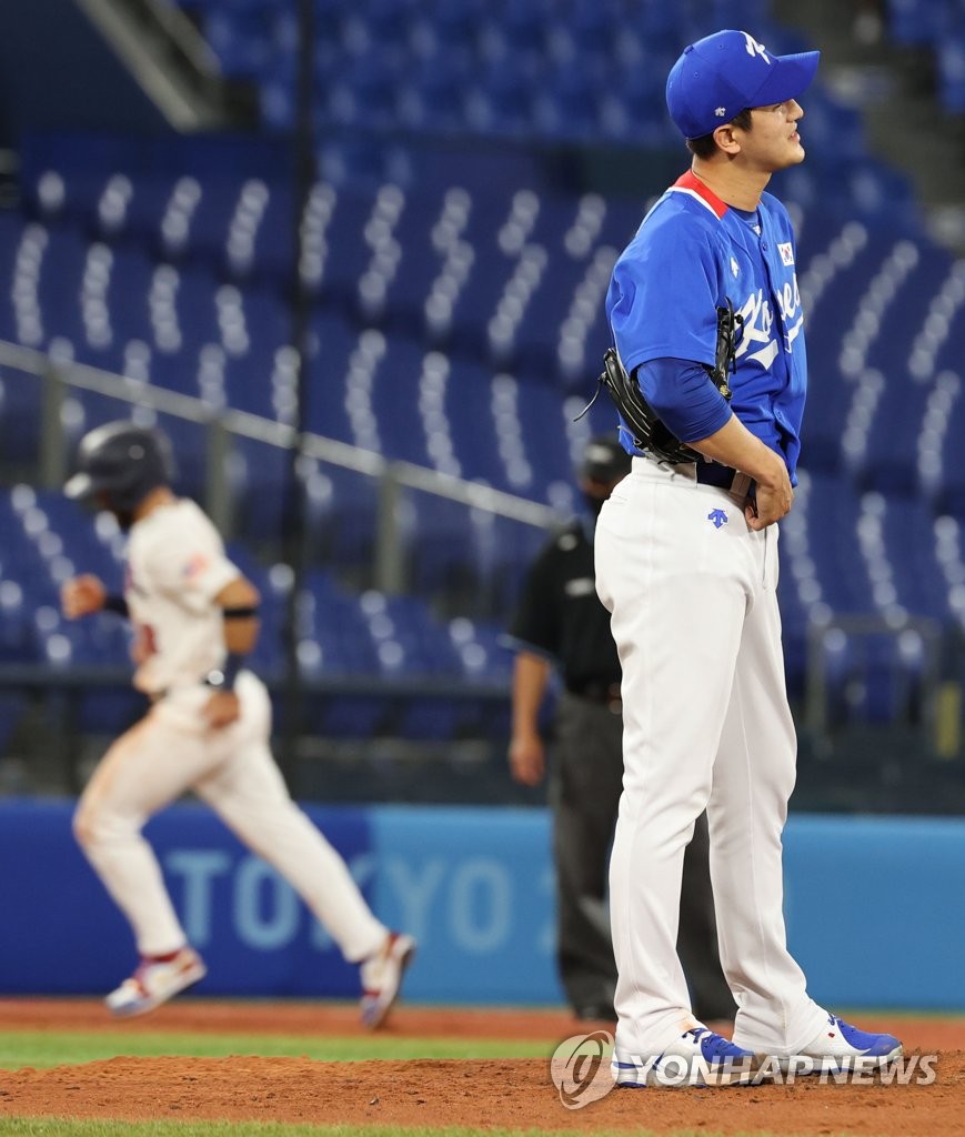 7月31日，东京奥运会棒球分组循环赛B组第二轮韩国队对阵美国的比赛在日本横滨棒球场进行。图为韩国队高永表面露遗憾之情。 韩联社