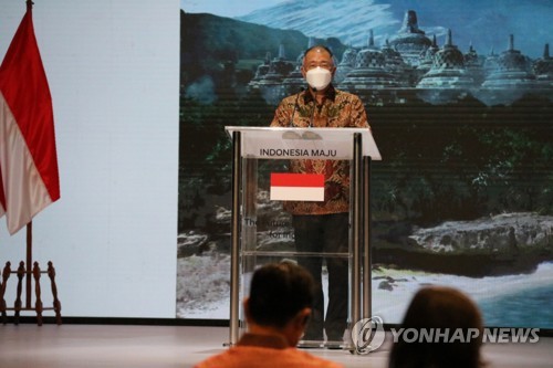 资料图片：郑义宣在印尼致辞。 韩联社
