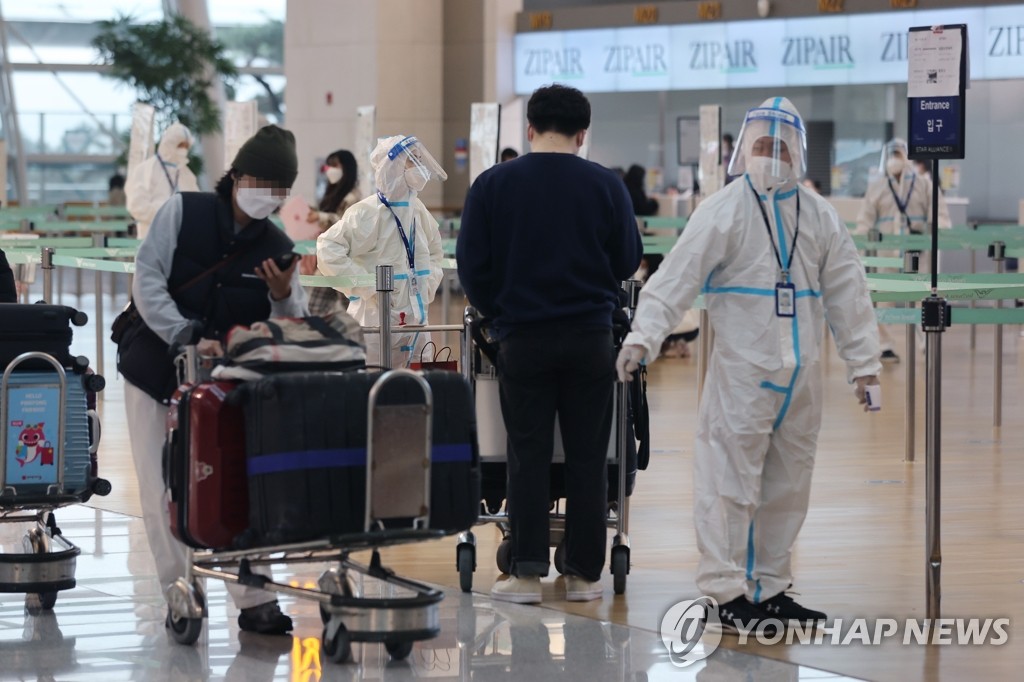 资料图片：仁川国际机场值机大厅 韩联社