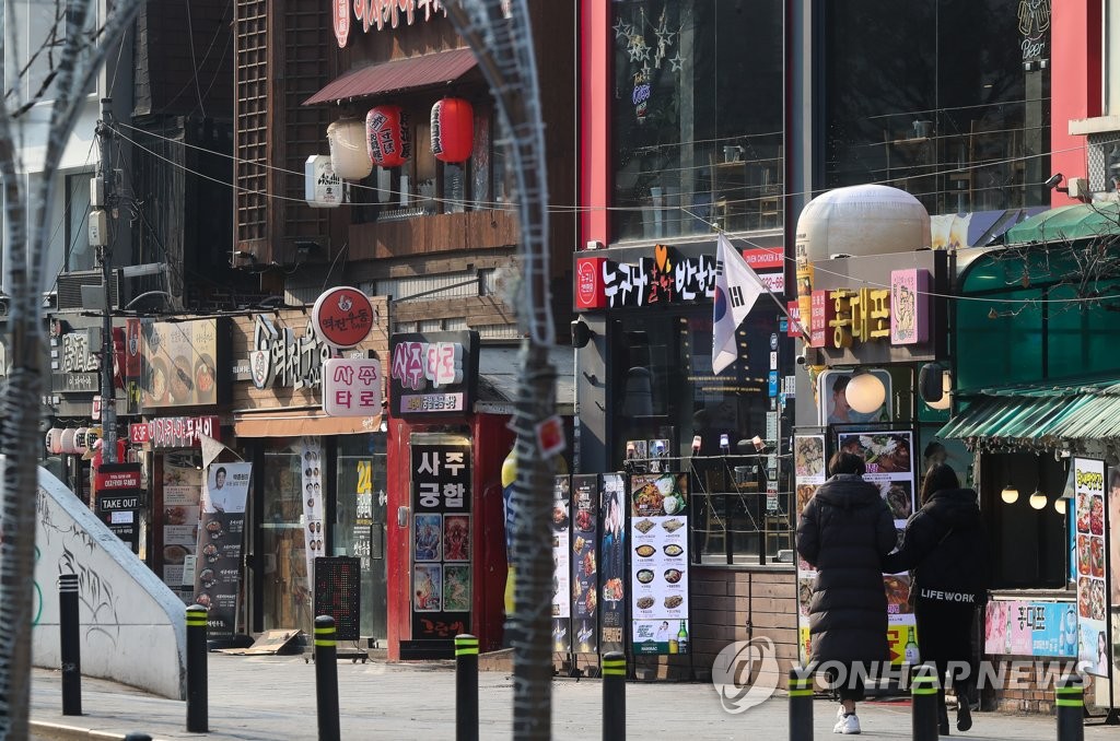 资料图片：首尔美食街 韩联社