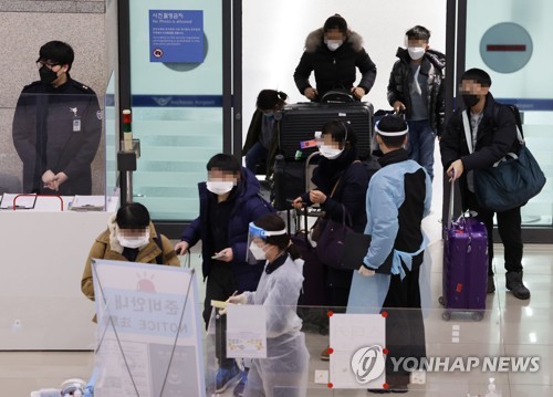 在哈被困韩国客机载47人安全回国