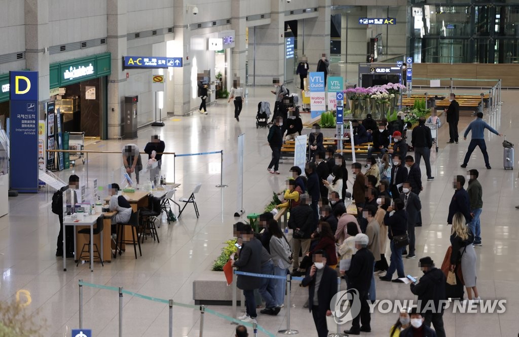 资料图片：仁川国际机场第一航站楼到达大厅 韩联社