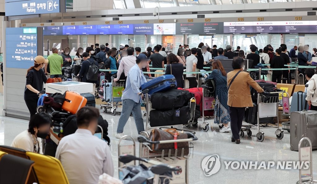 资料图片：仁川国际机场出境厅 韩联社