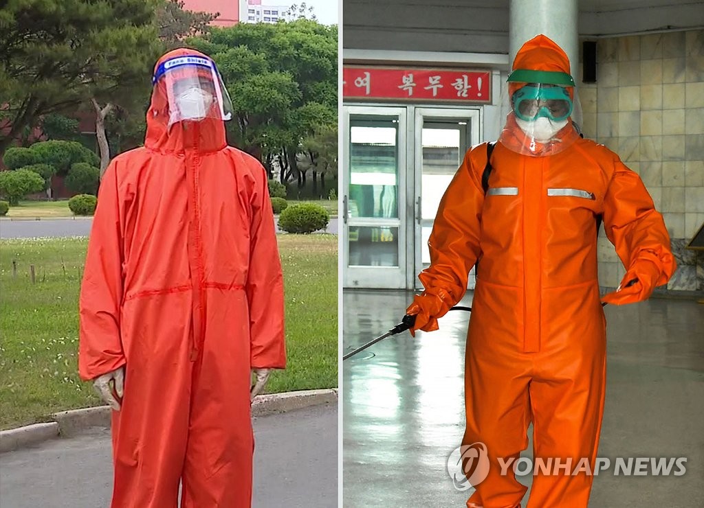 朝鲜防疫人员戴新型防护面罩